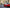 Red Ferrari near Champs-Elysées Paris with roller blader - Made You Look fine art print by Paul Holland