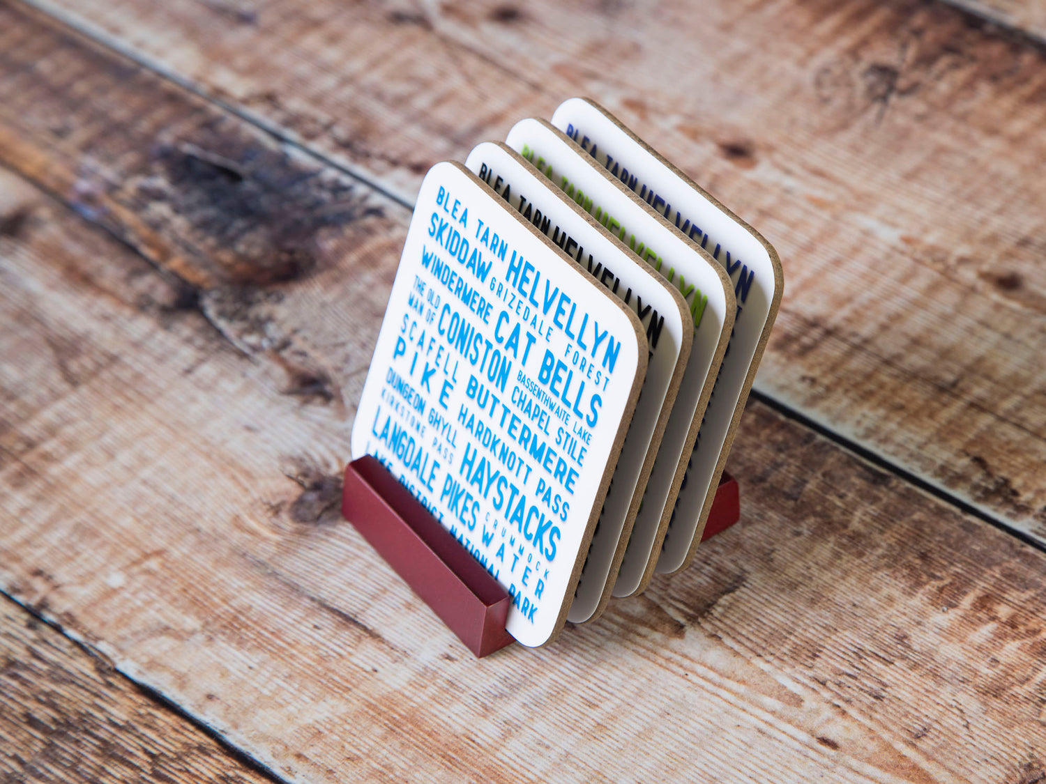 Image showing a set of four coasters in a coaster stand