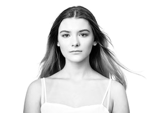 The monochrome image accompanying this product shows a young woman, photographed in the studio by Paul Holland